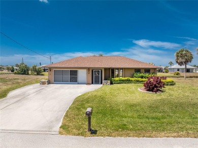 Under contract-accepting backup offers. Canalfront Home in on Rotonda Golf and Country Club The Palms Course in Florida - for sale on GolfHomes.com, golf home, golf lot