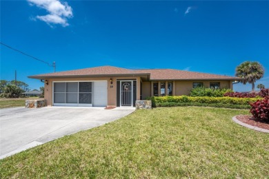 Under contract-accepting backup offers. Canalfront Home in on Rotonda Golf and Country Club The Palms Course in Florida - for sale on GolfHomes.com, golf home, golf lot
