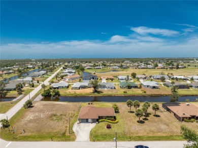 Under contract-accepting backup offers. Canalfront Home in on Rotonda Golf and Country Club The Palms Course in Florida - for sale on GolfHomes.com, golf home, golf lot