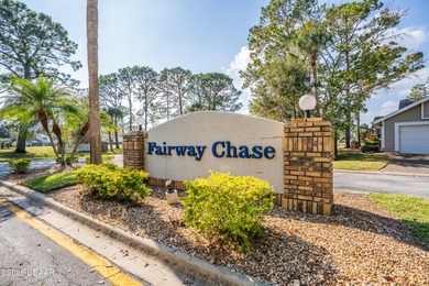 Experience the essence of refined Florida living in this on Spruce Creek Golf Club in Florida - for sale on GolfHomes.com, golf home, golf lot