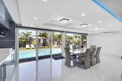 Beautifully renovated 5.5-bedroom, 3.5-bathroom pool home on a on The Club at Emerald Hills in Florida - for sale on GolfHomes.com, golf home, golf lot