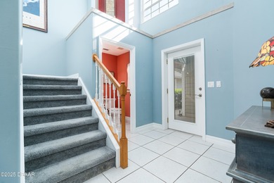 Experience the essence of refined Florida living in this on Spruce Creek Golf Club in Florida - for sale on GolfHomes.com, golf home, golf lot