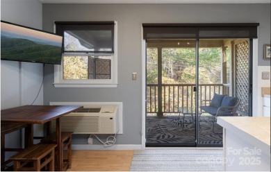 Great upper corner unit with no building next door. Located at on Rumbling Bald Resort on Lake Lure in North Carolina - for sale on GolfHomes.com, golf home, golf lot
