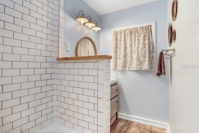 Welcome to this delightful 1950's gem, nestled right on the 12th on Temple Terrace Golf and Country Club in Florida - for sale on GolfHomes.com, golf home, golf lot