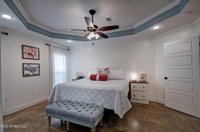 PERFECTION in Patrick Farms! Situated on a spacious golf course on Patrick Farms Golf Club in Mississippi - for sale on GolfHomes.com, golf home, golf lot
