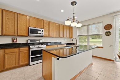 How does summer overlooking the golf course sound? Come view on Foxford Hills Golf Club in Illinois - for sale on GolfHomes.com, golf home, golf lot