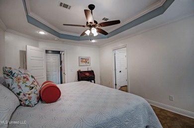 PERFECTION in Patrick Farms! Situated on a spacious golf course on Patrick Farms Golf Club in Mississippi - for sale on GolfHomes.com, golf home, golf lot