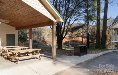 Great upper corner unit with no building next door. Located at on Rumbling Bald Resort on Lake Lure in North Carolina - for sale on GolfHomes.com, golf home, golf lot