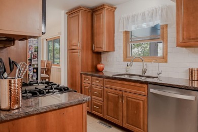 Beautiful MOVE-IN-READY home on the Golf Course With FANTASTIC on Lakes of the Four Seasons Country Club in Indiana - for sale on GolfHomes.com, golf home, golf lot