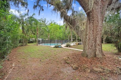 Welcome to this delightful 1950's gem, nestled right on the 12th on Temple Terrace Golf and Country Club in Florida - for sale on GolfHomes.com, golf home, golf lot