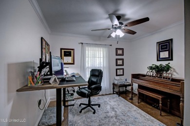 PERFECTION in Patrick Farms! Situated on a spacious golf course on Patrick Farms Golf Club in Mississippi - for sale on GolfHomes.com, golf home, golf lot