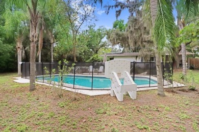 Welcome to this delightful 1950's gem, nestled right on the 12th on Temple Terrace Golf and Country Club in Florida - for sale on GolfHomes.com, golf home, golf lot