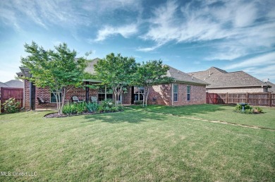 PERFECTION in Patrick Farms! Situated on a spacious golf course on Patrick Farms Golf Club in Mississippi - for sale on GolfHomes.com, golf home, golf lot
