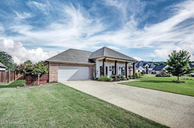 PERFECTION in Patrick Farms! Situated on a spacious golf course on Patrick Farms Golf Club in Mississippi - for sale on GolfHomes.com, golf home, golf lot