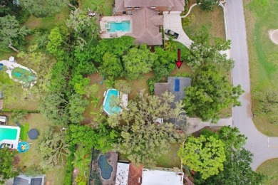 Welcome to this delightful 1950's gem, nestled right on the 12th on Temple Terrace Golf and Country Club in Florida - for sale on GolfHomes.com, golf home, golf lot
