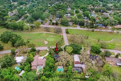 Welcome to this delightful 1950's gem, nestled right on the 12th on Temple Terrace Golf and Country Club in Florida - for sale on GolfHomes.com, golf home, golf lot