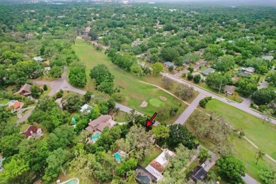 Welcome to this delightful 1950's gem, nestled right on the 12th on Temple Terrace Golf and Country Club in Florida - for sale on GolfHomes.com, golf home, golf lot