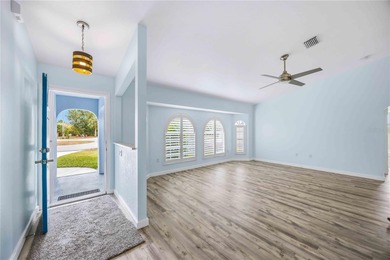 Beautifully updated 3-bedroom, 2-bath home located in the on Deep Creek Golf Club in Florida - for sale on GolfHomes.com, golf home, golf lot