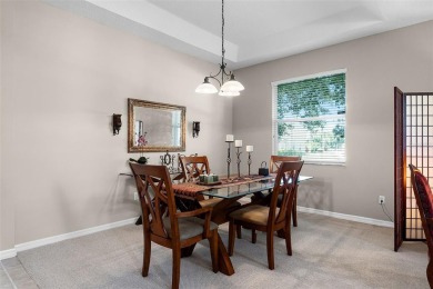 Welcome to this well-maintained two-story pool home located on a on North Shore Golf Club in Florida - for sale on GolfHomes.com, golf home, golf lot