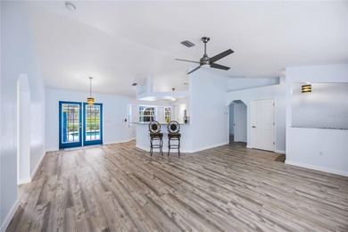 Beautifully updated 3-bedroom, 2-bath home located in the on Deep Creek Golf Club in Florida - for sale on GolfHomes.com, golf home, golf lot