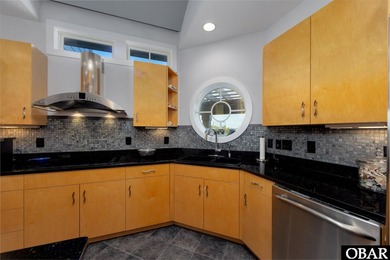 Stunning Currituck Club Retreat - Steps from the 13th Tee Box - on The Currituck Golf Club in North Carolina - for sale on GolfHomes.com, golf home, golf lot