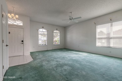 Discover space, light, and opportunity in this 3-bedroom, 2-bath on LPGA International Golf Course in Florida - for sale on GolfHomes.com, golf home, golf lot