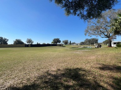This 2/2 home will be offered fully furnished and it includes on Lake Henry Golf Club in Florida - for sale on GolfHomes.com, golf home, golf lot