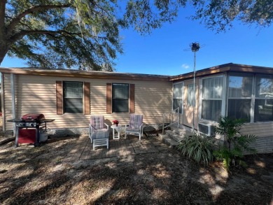 This 2/2 home will be offered fully furnished and it includes on Lake Henry Golf Club in Florida - for sale on GolfHomes.com, golf home, golf lot