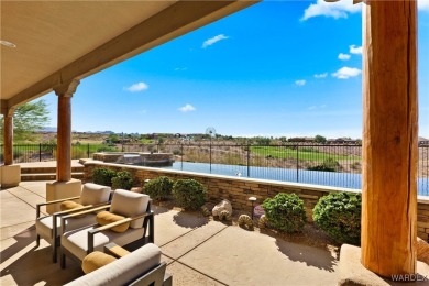 This stunning 5-bedroom, 4-bathroom custom home, built in 2011 on Laughlin Ranch Golf Club in Arizona - for sale on GolfHomes.com, golf home, golf lot