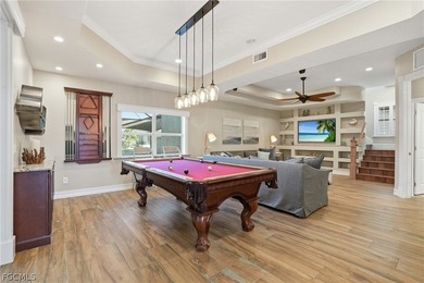 Welcome to your Resort-Style Gulf Access Retreat with Pool, Spa on Royal Tee Country Club in Florida - for sale on GolfHomes.com, golf home, golf lot