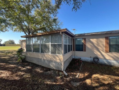 This 2/2 home will be offered fully furnished and it includes on Lake Henry Golf Club in Florida - for sale on GolfHomes.com, golf home, golf lot