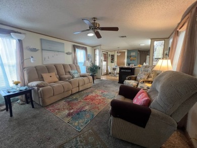 This 2/2 home will be offered fully furnished and it includes on Lake Henry Golf Club in Florida - for sale on GolfHomes.com, golf home, golf lot