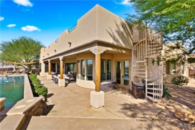 This stunning 5-bedroom, 4-bathroom custom home, built in 2011 on Laughlin Ranch Golf Club in Arizona - for sale on GolfHomes.com, golf home, golf lot