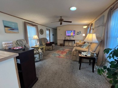 This 2/2 home will be offered fully furnished and it includes on Lake Henry Golf Club in Florida - for sale on GolfHomes.com, golf home, golf lot