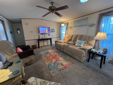 This 2/2 home will be offered fully furnished and it includes on Lake Henry Golf Club in Florida - for sale on GolfHomes.com, golf home, golf lot