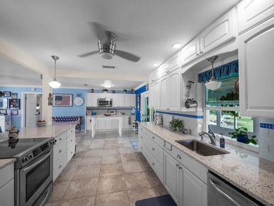 Beautifully renovated 3 bed, 2 bath home with a 2-car garage and on The Little Club in Florida - for sale on GolfHomes.com, golf home, golf lot