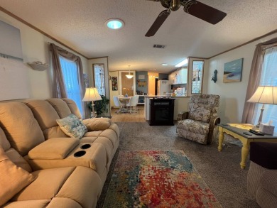 This 2/2 home will be offered fully furnished and it includes on Lake Henry Golf Club in Florida - for sale on GolfHomes.com, golf home, golf lot