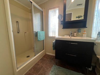 This 2/2 home will be offered fully furnished and it includes on Lake Henry Golf Club in Florida - for sale on GolfHomes.com, golf home, golf lot
