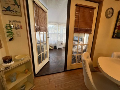 This 2/2 home will be offered fully furnished and it includes on Lake Henry Golf Club in Florida - for sale on GolfHomes.com, golf home, golf lot