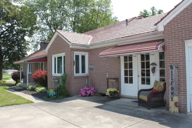 THIS LOVELY RANCH HOME IS A MUST SEE IN THE PEACEFUL GOLF COURSE on Harbor Hills Country Club in Ohio - for sale on GolfHomes.com, golf home, golf lot