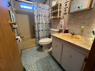 This 2/2 home will be offered fully furnished and it includes on Lake Henry Golf Club in Florida - for sale on GolfHomes.com, golf home, golf lot