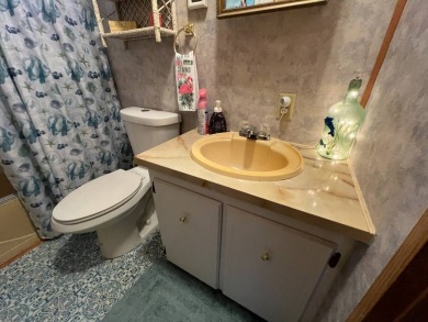 This 2/2 home will be offered fully furnished and it includes on Lake Henry Golf Club in Florida - for sale on GolfHomes.com, golf home, golf lot