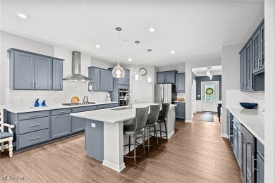 Welcome to this pristine 2-bedroom, 2-bath home with stunning on Quail Hollow Resort and Country Club in Ohio - for sale on GolfHomes.com, golf home, golf lot
