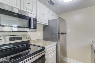Move-In Ready 1-Bedroom Condo in Molokai VillageThis upstairs on Diamondhead Country Club in Mississippi - for sale on GolfHomes.com, golf home, golf lot