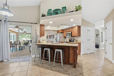 Welcome to this beautiful 3-bedroom, 2-bath, 2-car garage pool on Deep Creek Golf Club in Florida - for sale on GolfHomes.com, golf home, golf lot