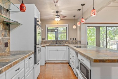 This 2-bedroom, 3-bath townhome offers the ideal opportunity to on Riverhill Country Club in Texas - for sale on GolfHomes.com, golf home, golf lot