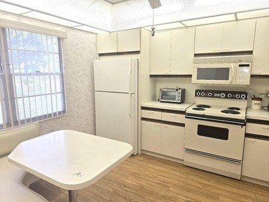 GROUND FLOOR 2/2 LUXURY UNIT IN SOUGHT AFTER ARUBA W/ GOLF on  in Florida - for sale on GolfHomes.com, golf home, golf lot