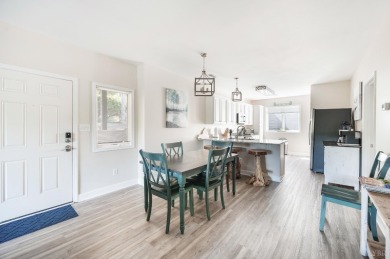 Rare chance to own one of only 12 walkout end units at Mariners on Mariners Landing Golf and Country Club in Virginia - for sale on GolfHomes.com, golf home, golf lot