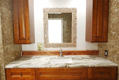 Welcome to Summer Green! This stunning, cozy 2bed/2bath second on Capri Isle Golf Club in Florida - for sale on GolfHomes.com, golf home, golf lot