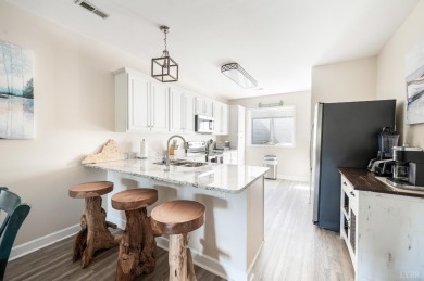Rare chance to own one of only 12 walkout end units at Mariners on Mariners Landing Golf and Country Club in Virginia - for sale on GolfHomes.com, golf home, golf lot
